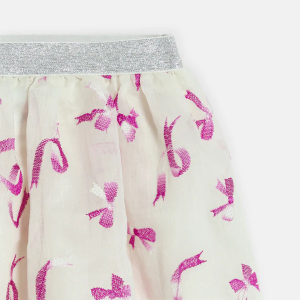 Baby girl's pink flowing skirt with bows and shiny waistband