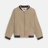 Boy's beige fabric baseball jacket.