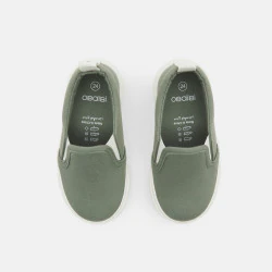 Baby boy's green slip-on...