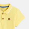 Baby boy's yellow piqué polo shirt