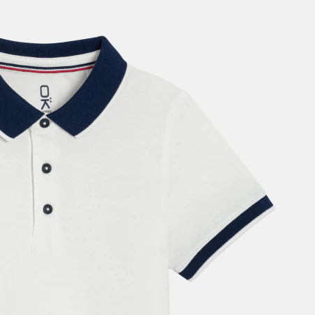 Boy's white jersey piqué polo shirt with short sleeves